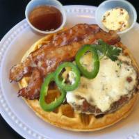 Fried Ranch Chicken on A Waffle · Fried ranch chicken on a Brussels style waffle with bacon and jalapenos, with butter and syr...