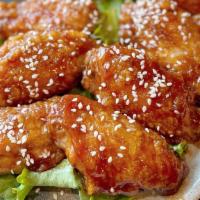 香汁烧鸡翅  Teriyaki Chicken Wings · mildly Spicy fried wings,  tossed with house teriyaki sauce.