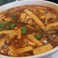 酸 辣 汤 Hot and Sour Soup · Spicy. With bamboo shoot, wood ear, egg, and onion.