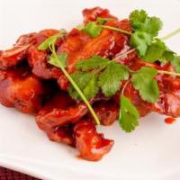 糖醋骨 Sweet &Sour Pork Ribs · pork riblets in sweet and sour sauce