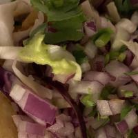 Shrimp Tacos · Chipotle aioli, cilantro, slaw, onions, salsa nueve.