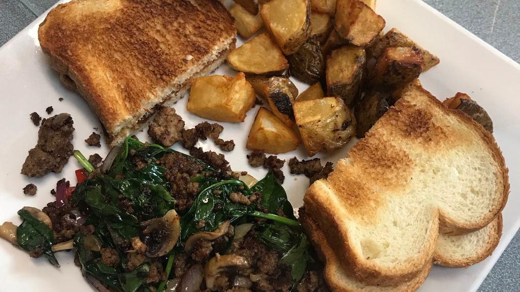 Joe's Special · Ground beef, mushrooms, onions, bell peppers, spinach. Served with grilled potatoes + toast.