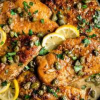 Chicken Picatta · Cooked in a buttery lemon sauce.