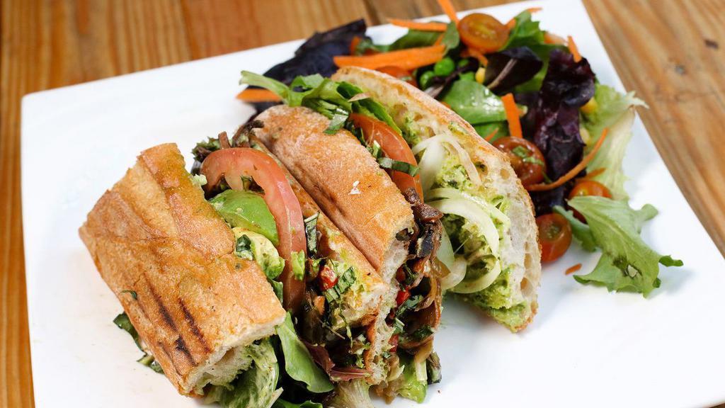 Roasted Vegetarian Wrap · Grilled eggplant, roasted red pepper, sauteed mushroom, caramelized onions, avocado, balsamic vinaigrette, with your choice of cheese.