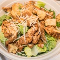 Traditional Caesar · Romaine hearts tossed with housemade caesar dressing, shredded Parmesan, and housemade crout...