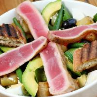 Salad Nicoise · Organic mixed greens tossed with our housemade balsamic vinaigrette dressing, ahi tuna, anch...