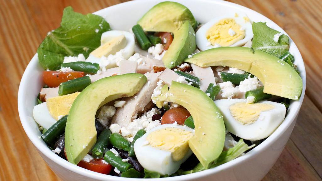 Mixed Cobb · Organic mixed greens tossed with our housemade balsamic vinaigrette dressing, smoked turkey, eggs, feta cheese, tomatoes, sliced oranges, black olives, and fresh green beans.