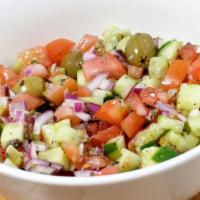 Mediterranean Salad Side · Chopped cucumber, tomatoes, olives, red onions, lemon juice, olive oil, salt, and pepper.