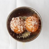 Gulab Jamun (2) · Milk and cottage cheese balls deep-fried served in condensed milk sauce flavored with saffro...