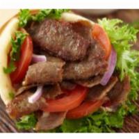 Gyro Wrap · Gyro (Lamb+Beef), Lettuce, Onion, Tomato, Tazitki Sauce, in Pita Bread.