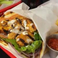 Chicken Gyro Wrap · Grilled Chicken, Pita, Lettuce, Tomatoes, Onions, Tzatziki Sauce, Tahini Sauce