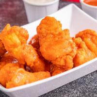 Boneless Chicken Wings · Crispy and juicy deep fried boneless chicken pieces with buffalo sauce, BBQ or lemon pepper ...