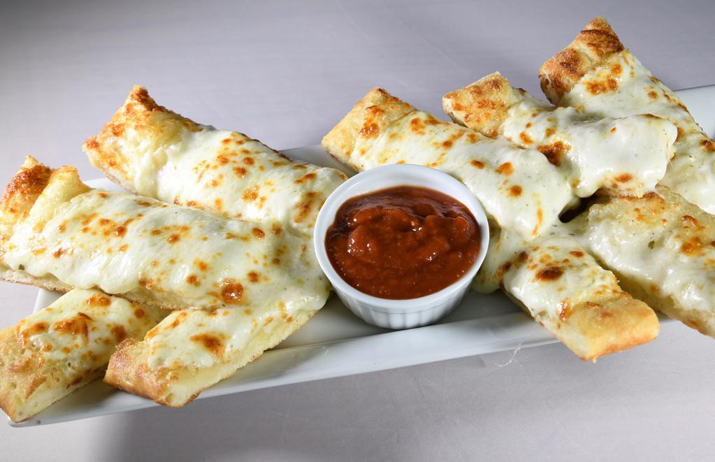 Pizza Sticks · Our best ever tasted appetizer, fresh made thick bread with creamy white sauce and lots of cheese served with marinara dipping sauce or ranch dressing.