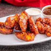 Chicken Wings · Crispy and juicy deep fried chicken wings with buffalo sauce, BBQ or lemon pepper and served...
