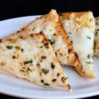 Garlic Bread with Cheese · Half loaf fresh made garlic bread topped with mozzarella cheese and served with marinara dip...