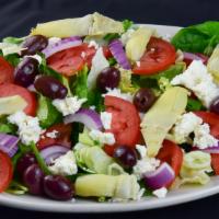 Mediterranean Salad (Family Size - Serves 5-6) · Vegetarian. Romain and iceberg lettuce, spinach, tomatoes, feta cheese, Kalamata olives, red...