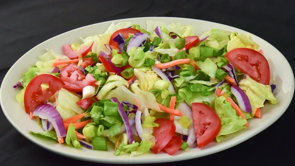 Tossed Salad (Individual Size - Serves 1-2) · Vegetarian. Romain and iceberg lettuce, red cabbage, scallions, tomatoes, carrots and red onions with Italian dressing.