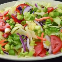 Tossed Salad (Family Size - Serves 5-6) · Vegetarian. Romain and iceberg lettuce, red cabbage, scallions, tomatoes, carrots and red on...