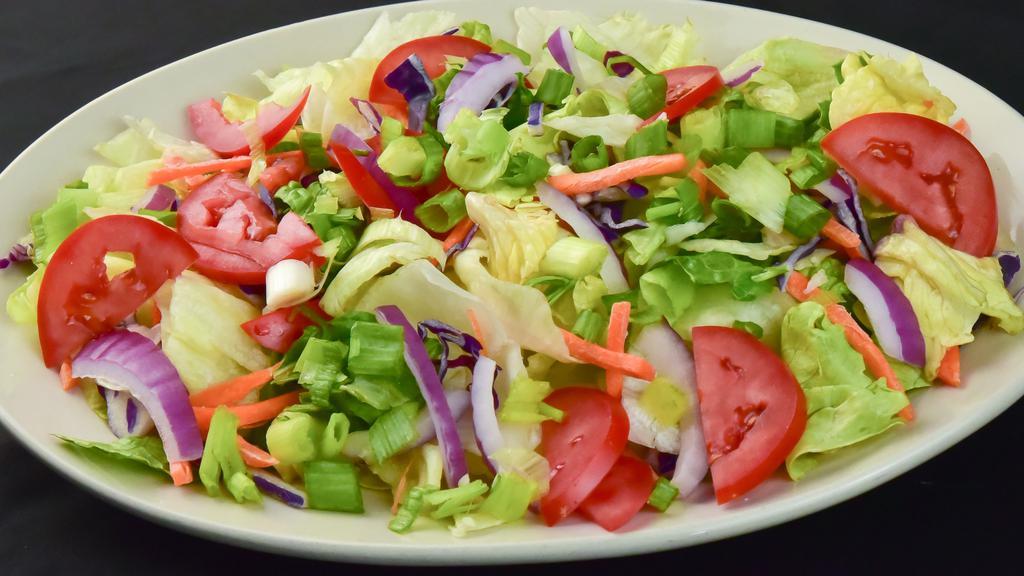Tossed Salad (Family Size - Serves 5-6) · Vegetarian. Romain and iceberg lettuce, red cabbage, scallions, tomatoes, carrots and red onions with Italian dressing.