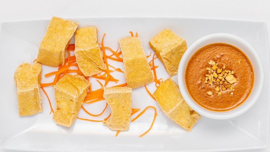 Golden Fried Tofu · Crispy tofu served with peanut dipping sauce.