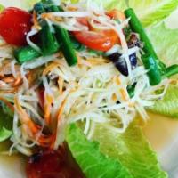 Papaya Salad · Spicy. Thai style salad with shredded green papaya, green bean, cherry tomato, carrot, and g...