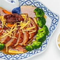 Crispy Honey Glazed Duck · Roasted duck on steamed broccoli, carrot, spinach, baby corn topped with honey-ginger sauce.