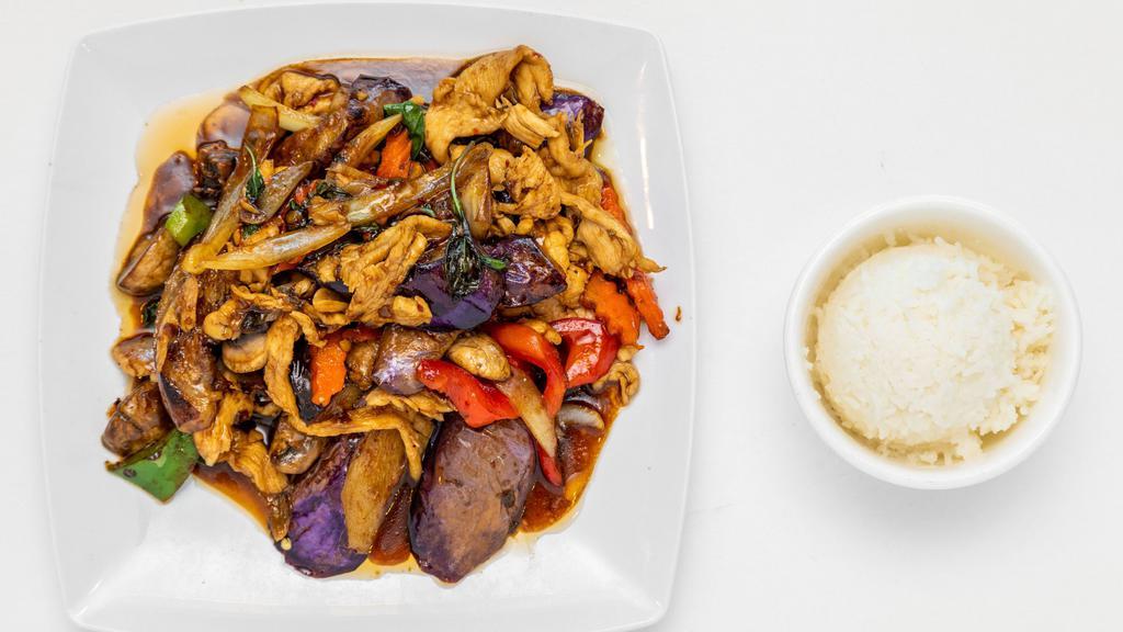 Spicy Eggplant · Spicy. Stir-fried eggplant, bell pepper, onion, mushroom, carrot, basil, and chili with your choice of protein.
