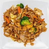 Pad See Ew · Pan-fried rice flat noodle with egg, carrot, cabbage, broccoli, garlic, and your choice of p...