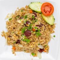 Chinese Sausage Fried Rice · Pan-Fried Rice with egg, Chinese sausage, yellow onion, green onion, peas, and carrot with c...