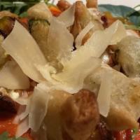 Fiori Di Zucca · Zucchini blossoms filled with fresh ricotta cheese and mozzarella served over marinara sauce.