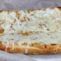 Cheesy Garlic Bread · A sub roll topped with cheddar garlic sauce and mozzarella cheese.
