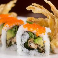 Spider Roll · In: deep fried soft shell crab, avocado, cucumber; out: tobiko.