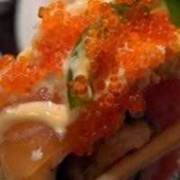 Flaming Dragon · In: Fresh water eel, salmon tempura, asparagus tempura
Out: Tuna, salmon, spicy crab meat, t...
