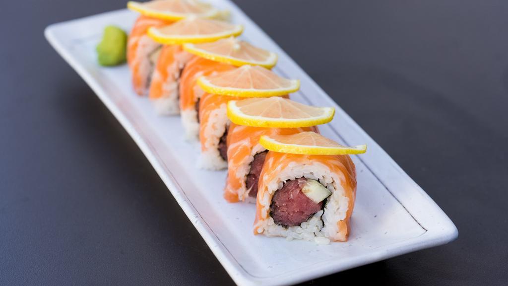  S & T Roll (8pcs) · Spicy tuna cucumber scallion topped salmon and lemon.