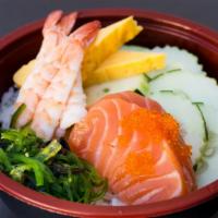 Poke Bowl · raw salmon mix sauce over rice with tamago cucumber tobiko seaweed salad green onion sesame ...