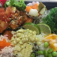 Lomi Salmon Poke · Serve sushi rice, tomato, onion, corn, soy beans, cucumber, carrot, avocado, pita chips & To...