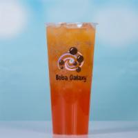 Mars · Rosy peach infused with green tea and topped with aloe vera and basil seeds.