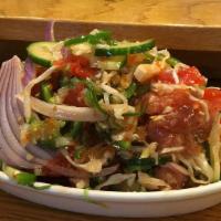 (AP) Poke Salad · Spicy. Sliced tuna sashimi mixed with vegetables and sauce. Slightly spicy.