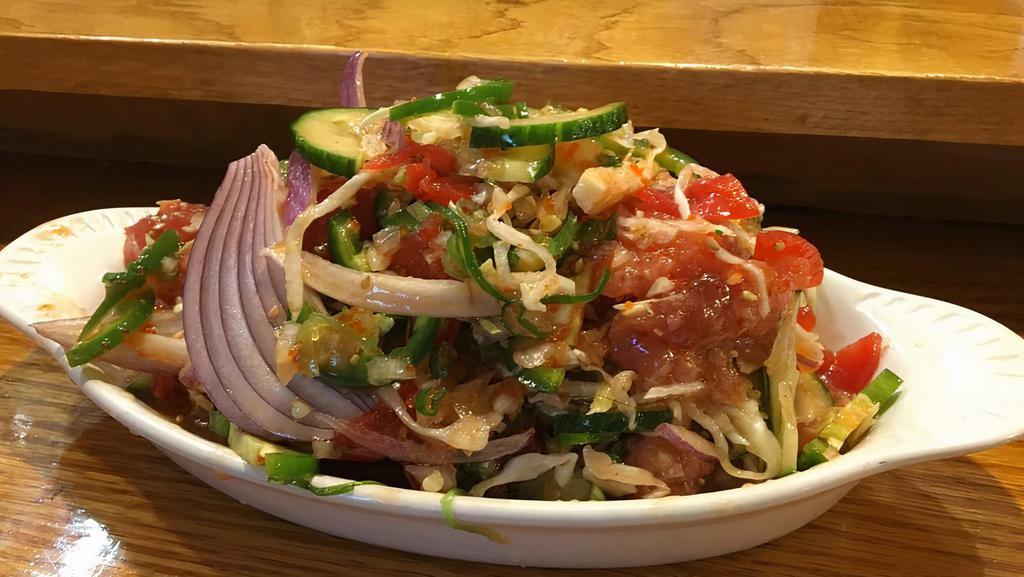 (AP) Poke Salad · Spicy. Sliced tuna sashimi mixed with vegetables and sauce. Slightly spicy.