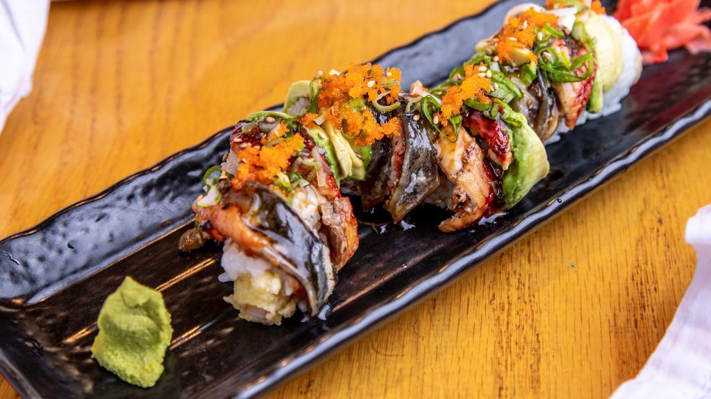 A's Roll · Inside: shrimp tempura, and avocado. Top: unagi (eel), avocado, and house sauce.