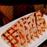 Grilled Pita · House made grilled pita bread