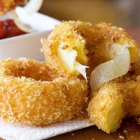 Onion Rings · Crispy golden-fried onion rings fresh out the fryer.