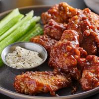 Breaded Honey Garlic Wings · Chef's Special! Crispy chicken wings topped with exquisite honey garlic sauce!