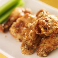 Breaded Garlic Parmesan Wings · Fresh chef's made garlic Parmesan sauce smothered on crispy chicken wings!