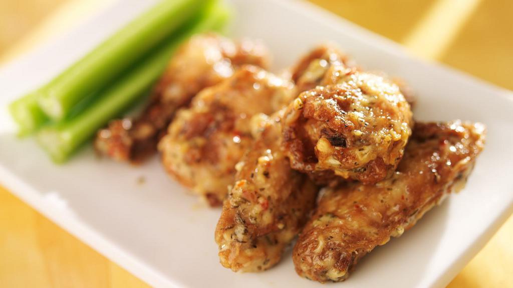 Boneless Garlic Parmesan Wings · Garlic Parmesan sauce smothered on crispy boneless chicken wings!