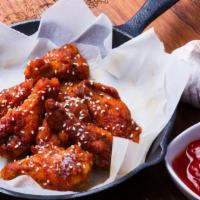Boneless Sweet & Sour Wings · Exquisite tangy sweet & sour sauce topped on bucket of crispy chicken wings!