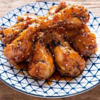 Breaded Sweet & Sour Wings · Exquisite tangy sweet & sour sauce topped on bucket of crispy chicken wings!
