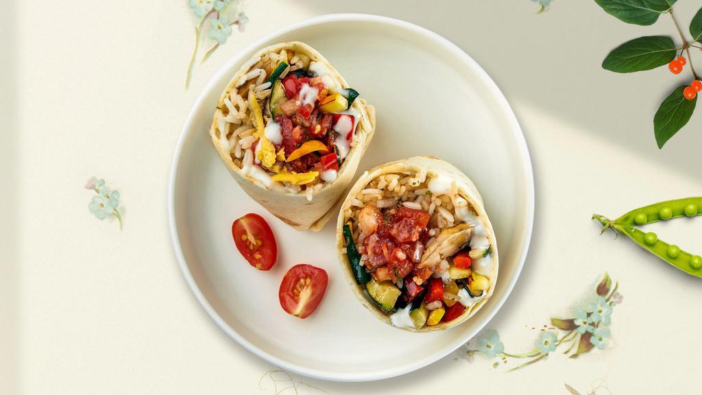Fancy Fajita Burrito · Grilled seasonal vegetables with your choice of meat wrapped in a warm tortilla with beans, guacamole, sour cream, salsa, cheese, and spanish rice.