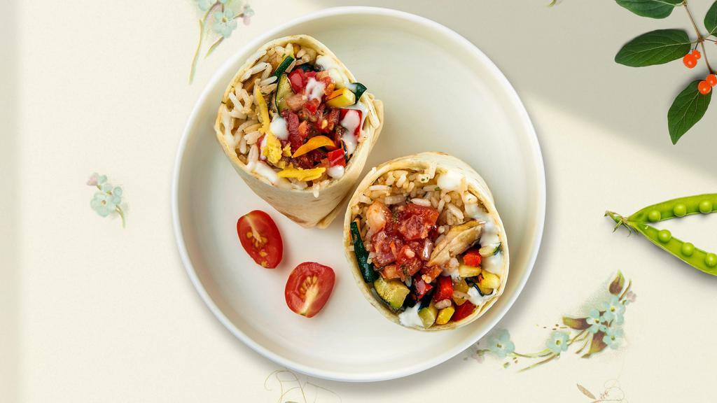 Veggie Medley Burrito · Grilled seasonal vegetables wrapped in a warm tortilla with beans, salsa, hot sauce, and spanish rice.