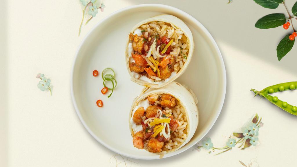 Shrimply Amazing Burrito · Fresh shrimp wrapped in a warm tortilla with beans, salsa, hot sauce, and spanish rice.